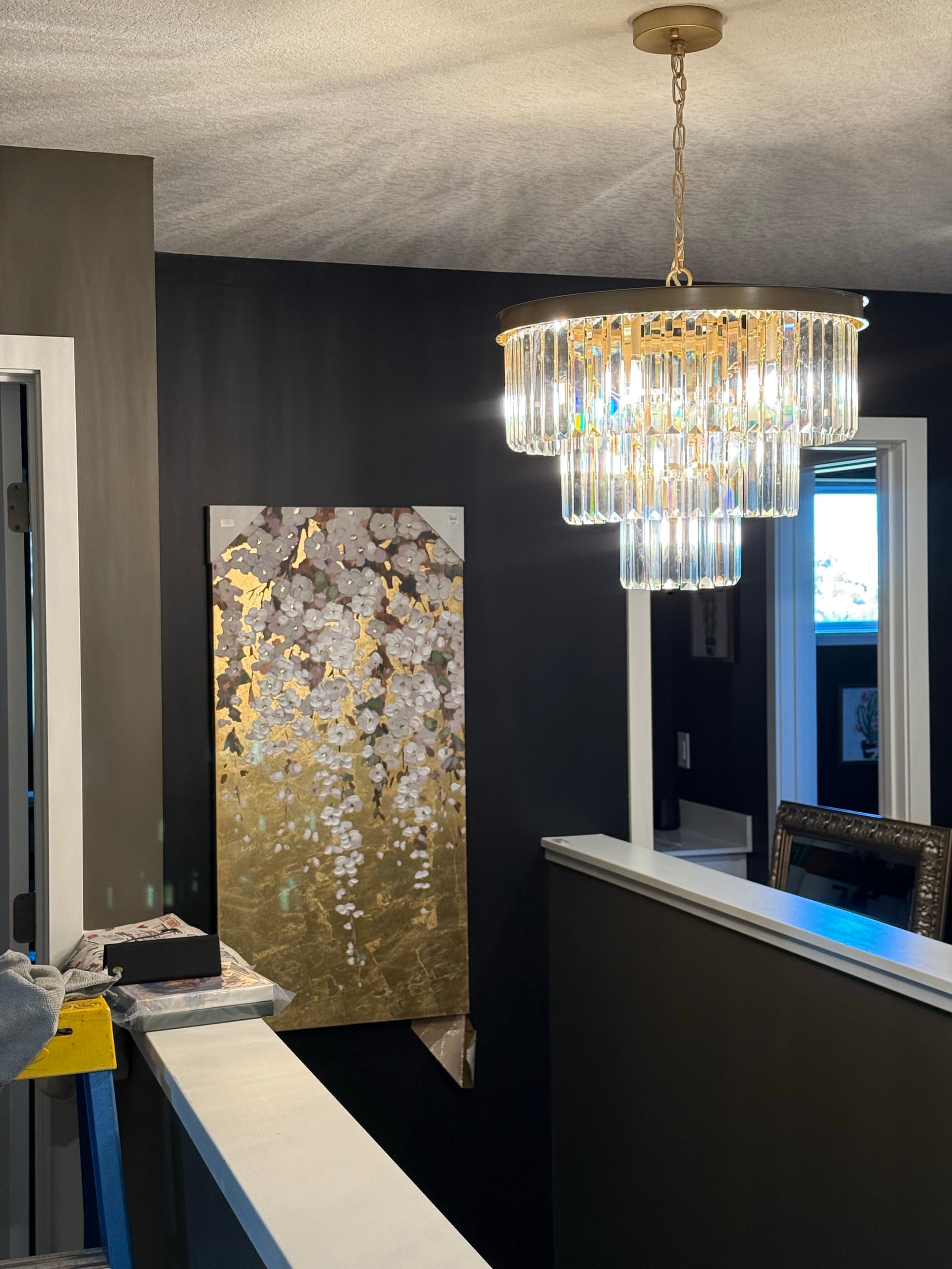 Crystal Chandelier Installation Over a Stairwell in Cottage Grove MN image